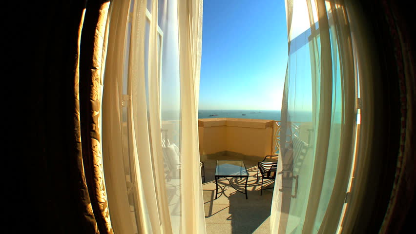 Comfortable lounging furniture on balcony of luxury apartment