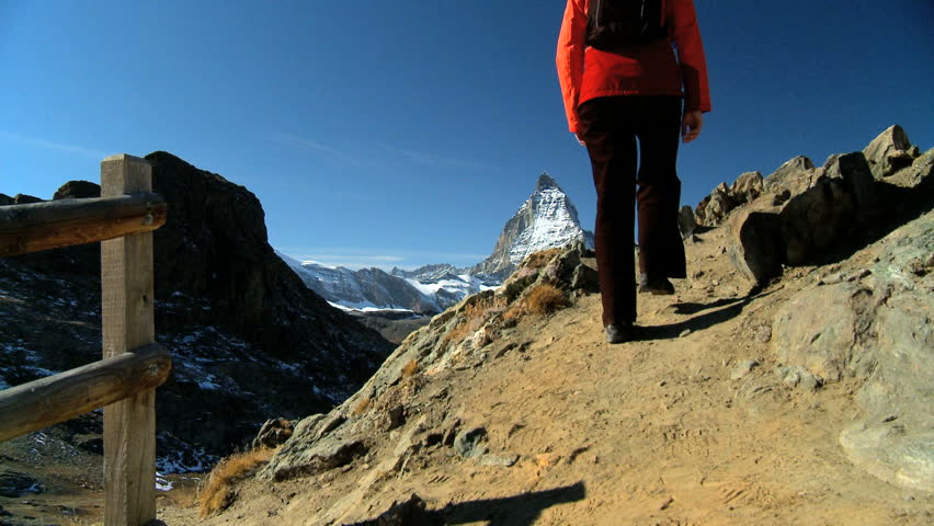 Female hiker enjoying view of the Matterhorn, Switzerland