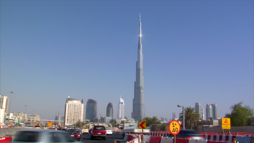 DUBAI - SEPTEMBER 9: A traffic shot with a nice reflection shows the highest building in the world, the Burj Khalifa (Dubai) on September 9.2009, Dubai, UAE. The Building is 828m high!