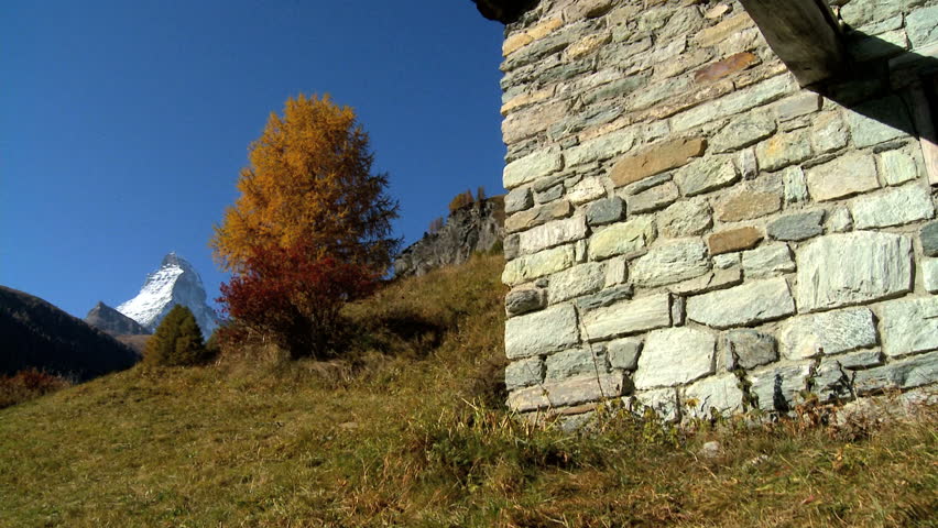 Fall in an alpine meadow, Zermatt, with the Matterhorn, motion jib