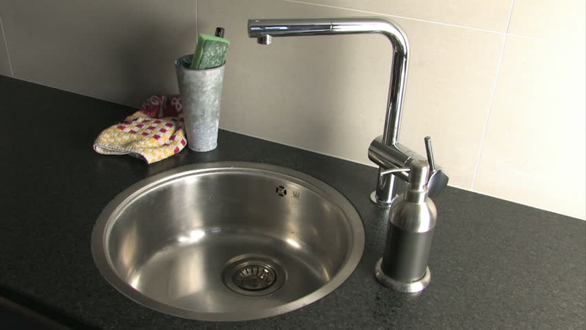 Washing hands carefully to clean them and prevent flu