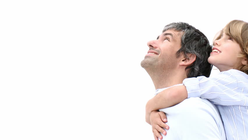 Close-up of father giving son piggyback ride. Footage in high definition 