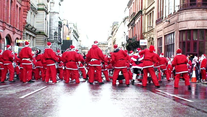 LIVERPOOL - DECEMBER 6: Thousands of runners take part in the annual "Santa Dash" for charity in December 6, 2009in Liverpool, England.