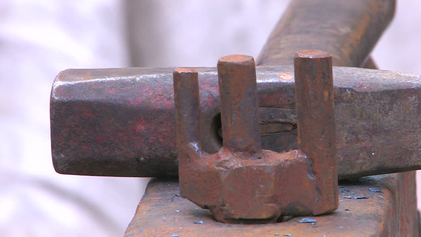 HD Craftsman working with metal by old fashioned way, with hammer and anvil, closeup, Canon XH A1, FullHD video, 1080p, 25fps, progressive scan 