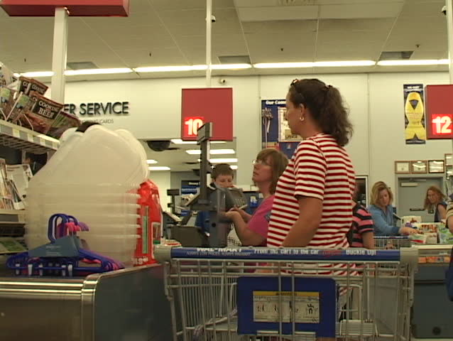 women checking their items out at Wal-Mart