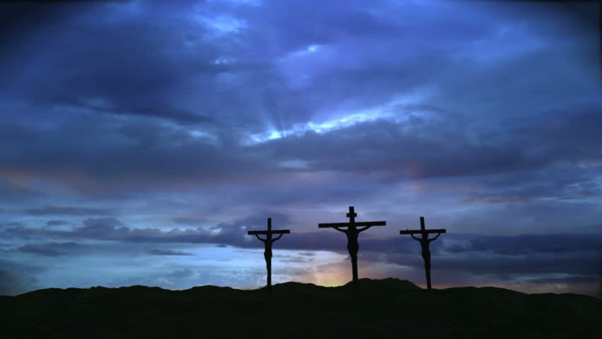 Three crosses with dark clouds