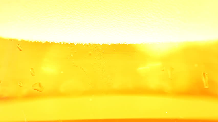 HD 1080p - macro of beer being poured into glass