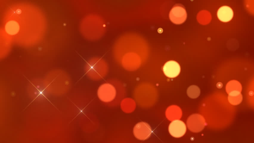 Seamlessly looping animation of defocused flowing light dots on red background 