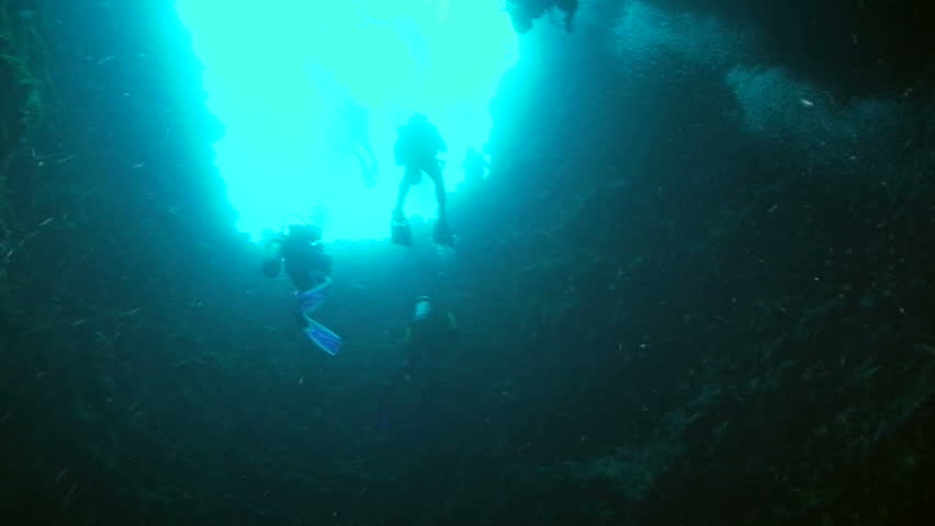 Scuba divers  from below, Palau, Micronesia