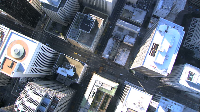 Aerial view looking down from above skyscrapers & city buildings of San Francisco, USA