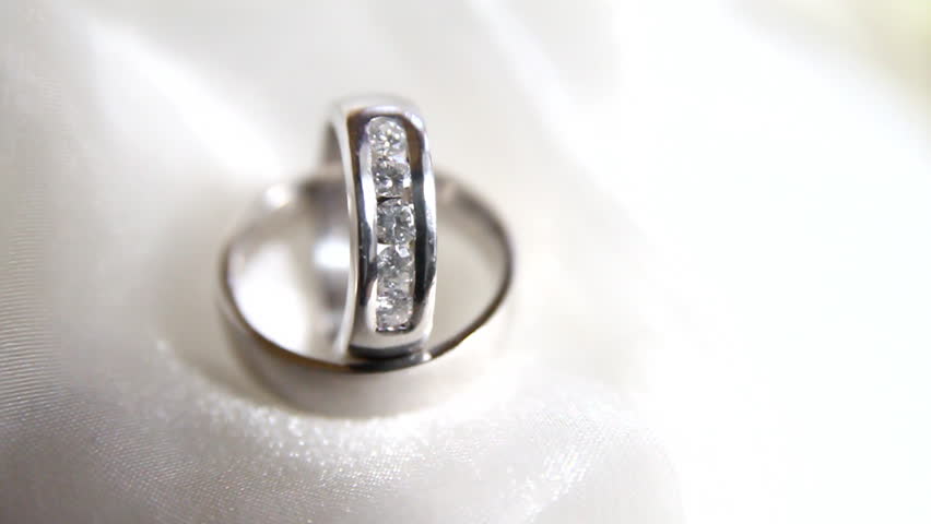 Wedding ring in a white silk