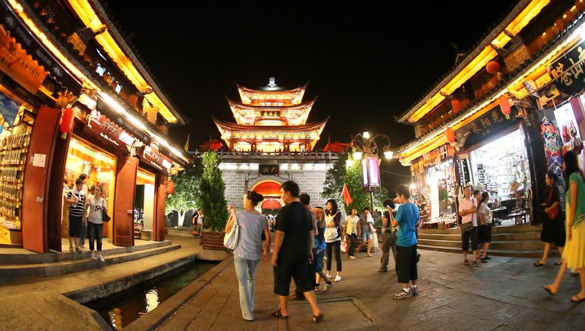 DALI, CHINA - AUGUST 20: In the peak of the season, Chinese and world travelers enjoy  old town Dali, including old architecture, restaurants and the local river in Yunnan province, August 20, 2009