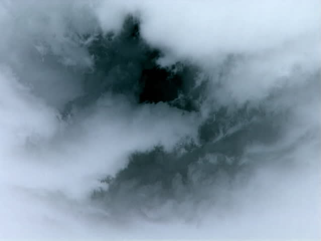 Storm clouds move quickly with the wind.