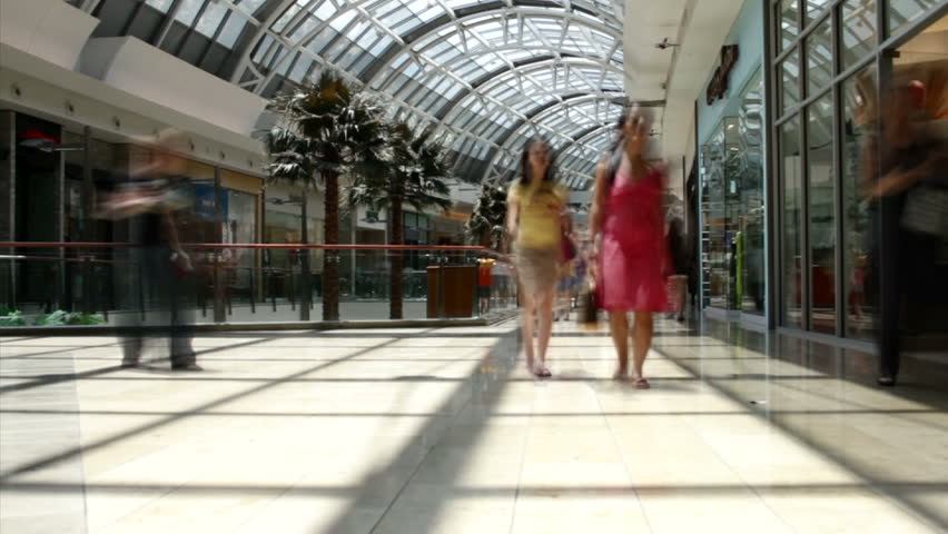 Time lapse of people at shopping mall.