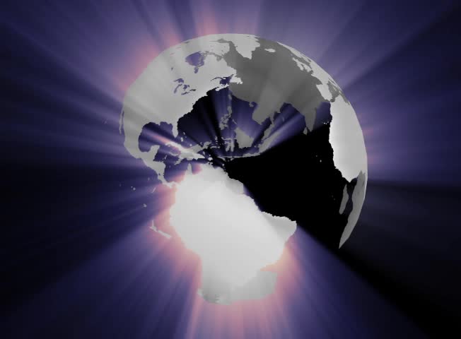 Globe Seamless Loop spins one time every thirty seconds. Gray land masses (no oceans) have a cool tone shimmering shining light.