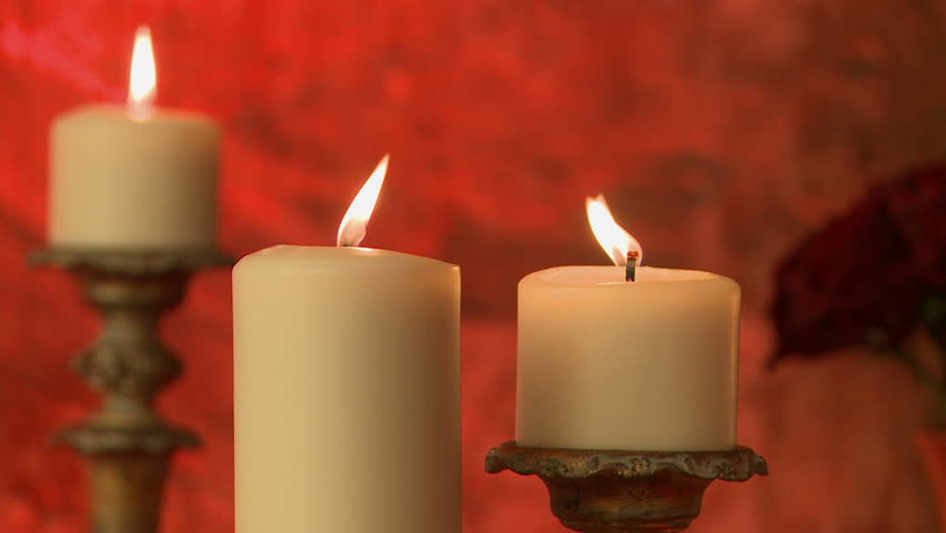 Pink Candle Flickering And Red Rose On Red Silk Stock Footage Video