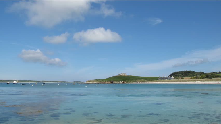Time lapse clouds above Old Grimsby harbour, Tresco Isles of Scilly.