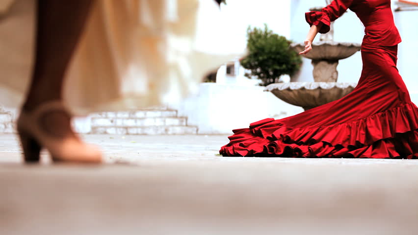 Two females dancing traditional flamenco in town square in Seville, Spain with audio