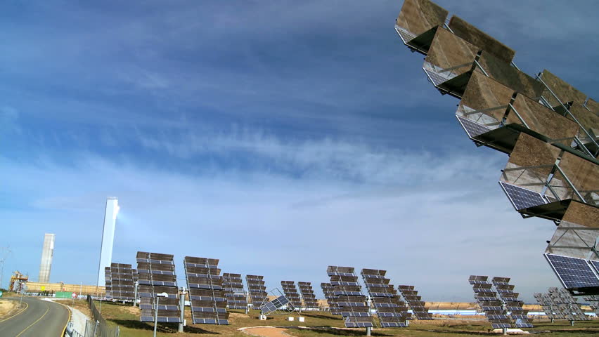 Solar power plant with photovoltaic & parabolic trough solar energy panels