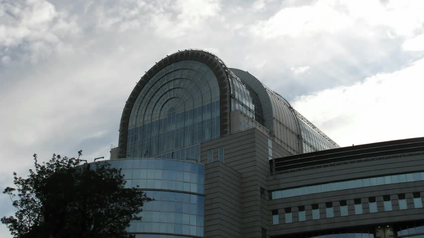 Time-lapse clouds over European Parliament, Brussels. 