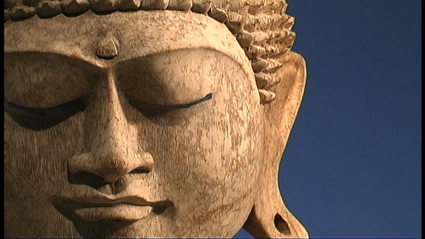 head of Buddha turns