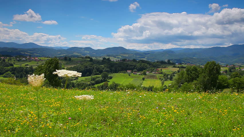 Sky clouds and hills meadow