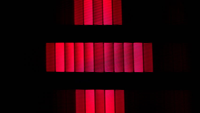 Stop motion of a fantastic retro red television spinning around abstract with distortion on the screen