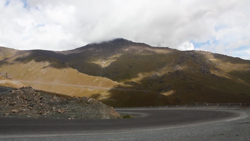 Winding road. Car on a bend.