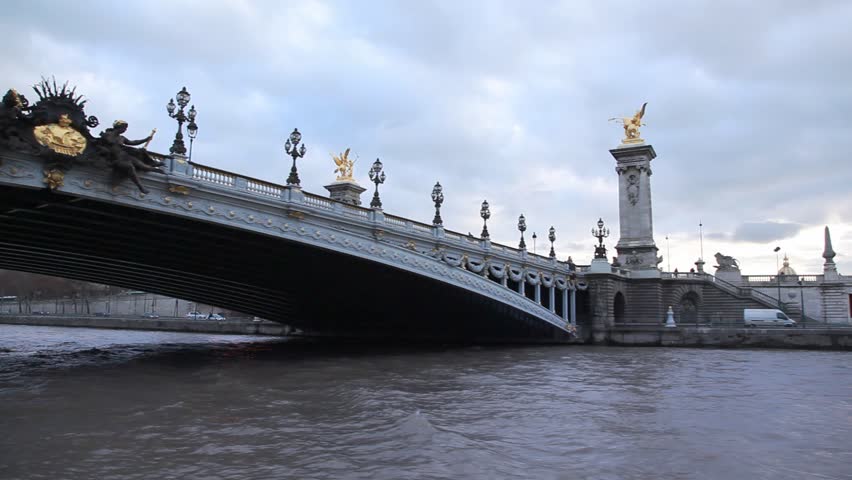 Pont Alexandre III bridge in Paris, France, view from Seine river