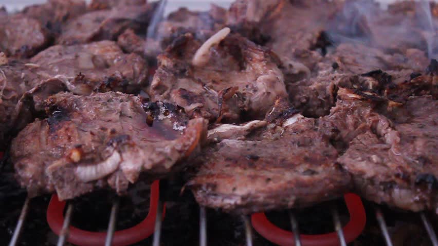 Lamb roasts on the grill
