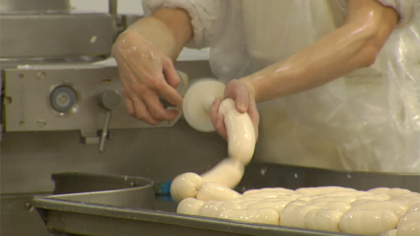 making sausage in a factory 