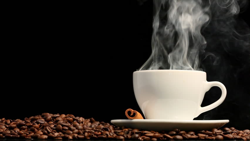 Cup of coffee on black background