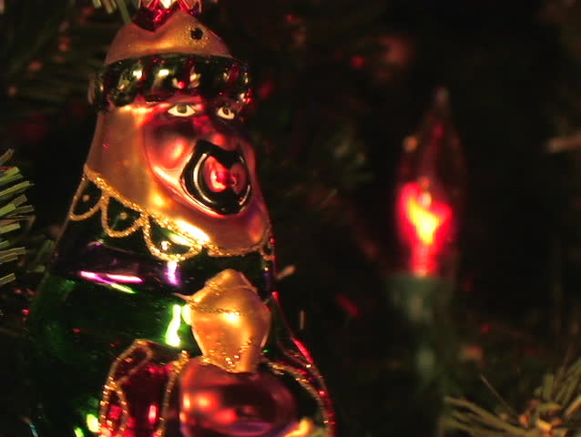 ORNAMENT HANGING ON A CHRISTMAS TREE DEPICTING ONE OF THE THREE WISE MEN.