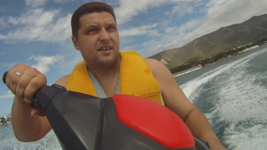 Man on the water scooter. Black sea, Gelendzik city, Krasnodar Krai , 300 km from Sochi , Russia