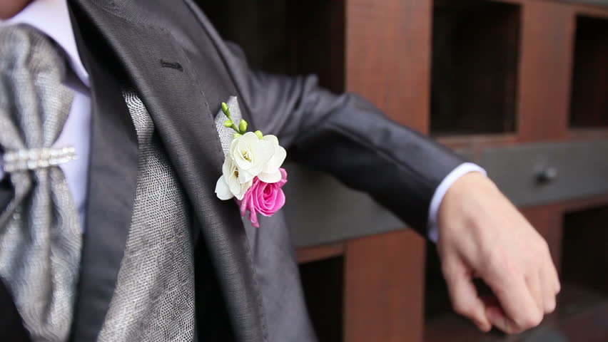 Groom In Grey Wedding Suit With Flower Small Chest Pocket Snaps Groom In Grey Wedding Suit With Flower Small Chest Pocket Snaps His Fingers Stock Footage Video 10015736 Shutterstock