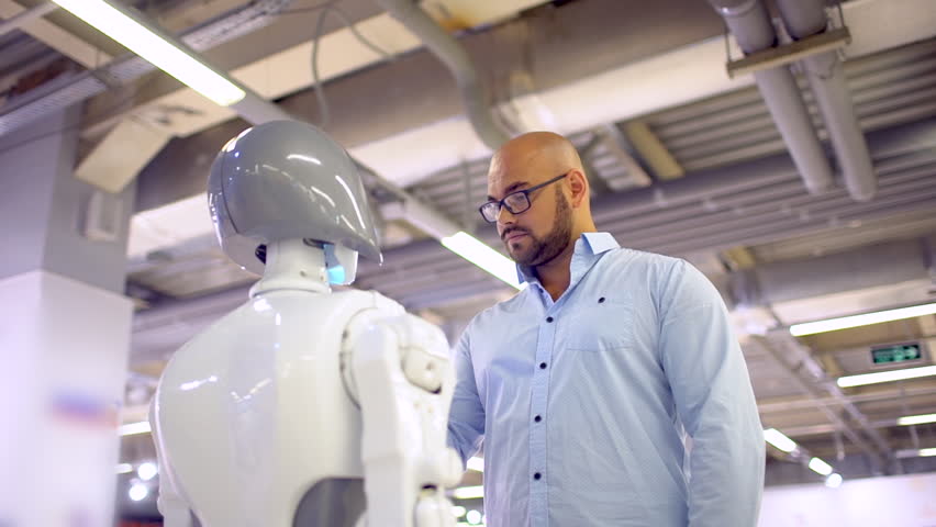 Cybernetic System Today Modern Robotic Technologies Humanoid Autonomous Robot A Man Using His Touch Screen High Tech System Today Cybernetic System Today Modern Robotic Technologies Humanoid Autonomous Robot A Man Using His Touch Screen High Tech System Today