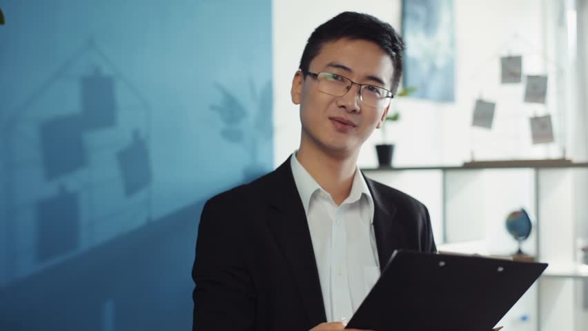 Asian man with glasses