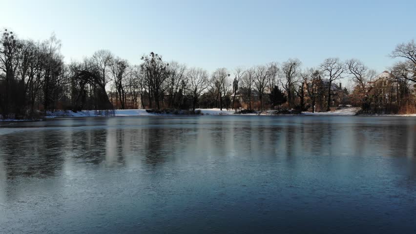 4k Aerial Drone Shot Of Frozen Pond In Grosser Garten Dresden Winter