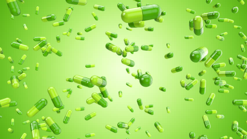 Green Pills Constantly Falling Against Stockowy materiał wideo (100% beztan...