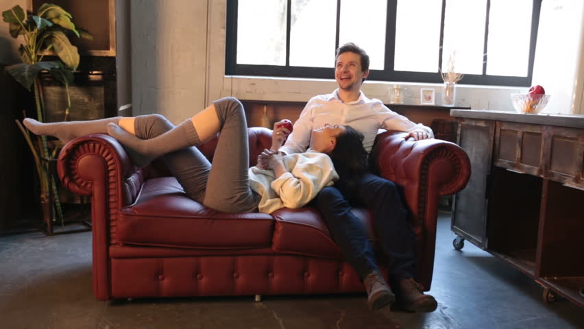 Hd00 07a Happy Couple Jokes Before Having Sex On The Couch In The