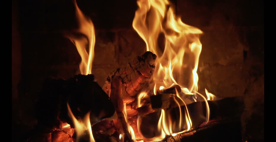 A Fireplace With A Hot Roaring Fire And Red Coals Looping Video Slow