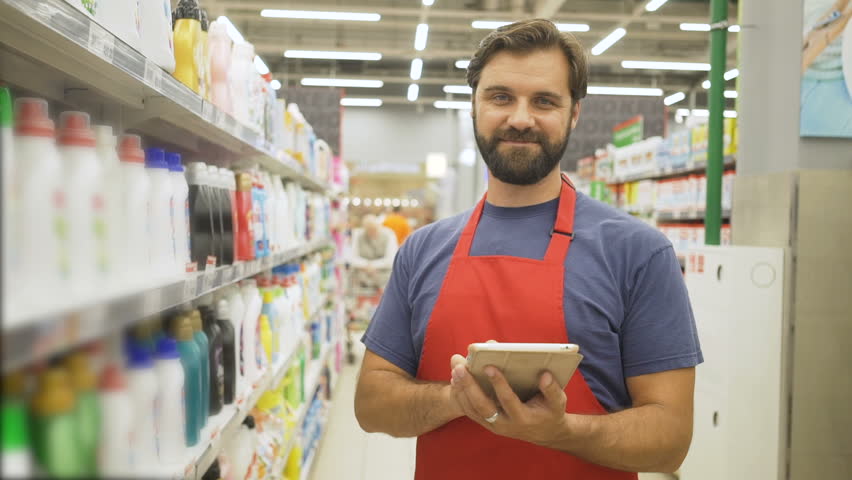 sales clerk with digital tablet stock footage video 100 royalty free 1013987486 shutterstock what is a sales clerk