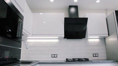 Interior Of White Modern Compact Kitchen Suspended Ceiling With Led Lamps