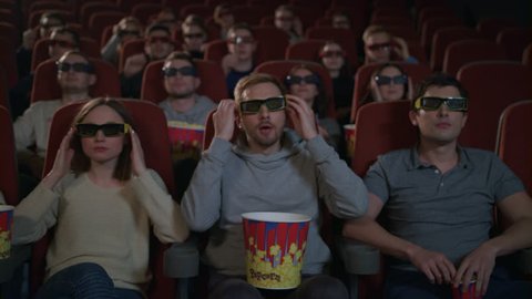 people watching a 3d movie