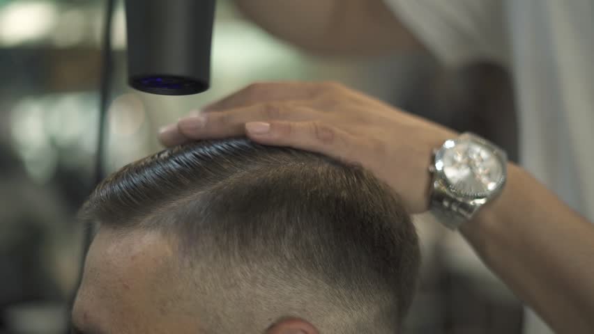 Hd00 11barber Drying Male Hair In Hairdressing Salon Close Up