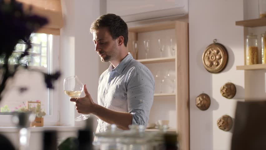Young Man Drinks White Wine Stock Footage Video 100 Royalty