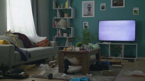 Zoom Out Of Concept Of The Mess In The Living Room After The Party