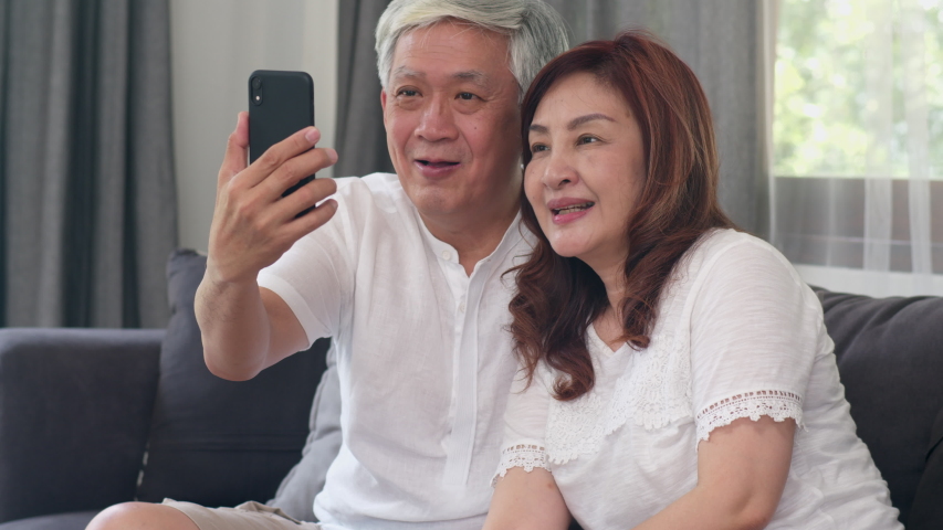 Asian Senior Couple Video Call Stock Footage Video 100 Royalty Free 1036245686 Shutterstock