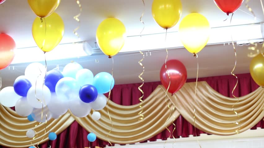 Yellow And Red Balloons Under Ceiling In Decorate Festive Hall