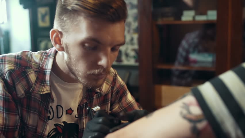 tattoo artist make tattoo at the studio stock footage video tattoo artist make tattoo at the studio stock footage video